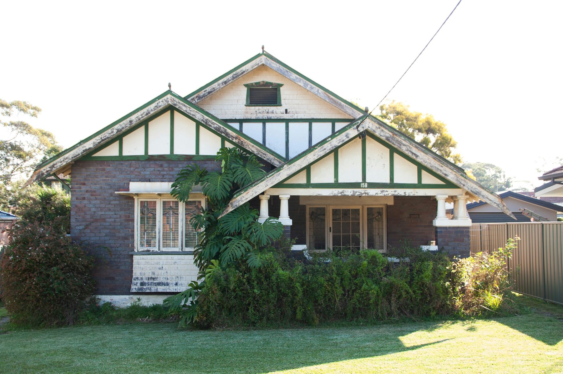 Federation-era character home with green-trimmed gables, typical of established Perth suburbs